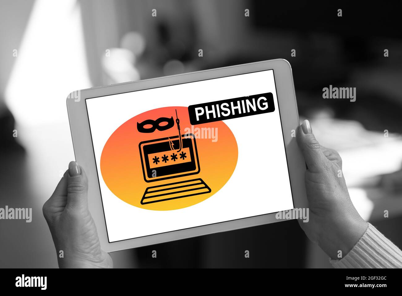 Phishing concept shown on a tablet held by a woman Stock Photo
