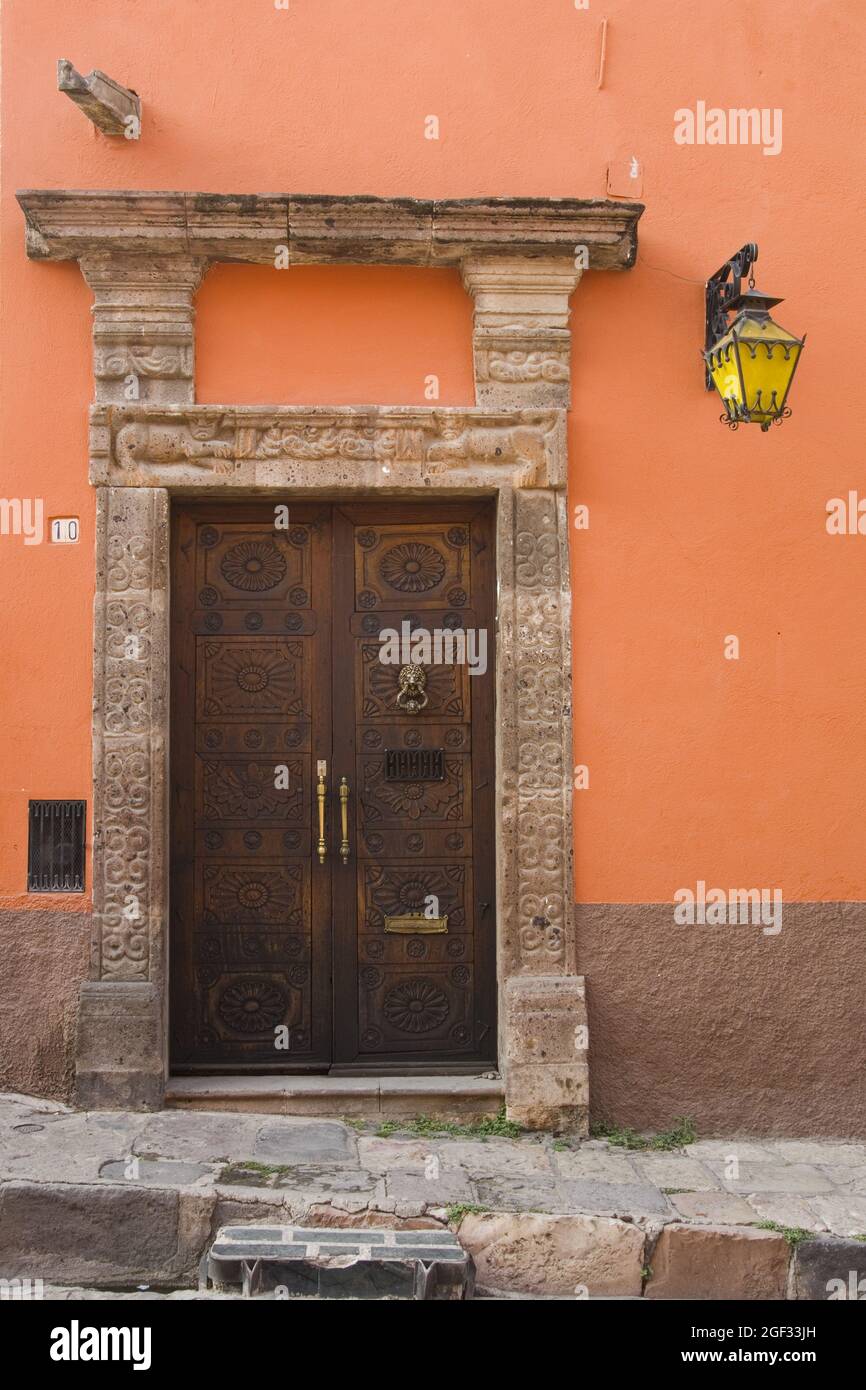 Historic town of San Miguel de Allende, Walls and Wooden Door, Province of Guanajuato, Mexico Stock Photo