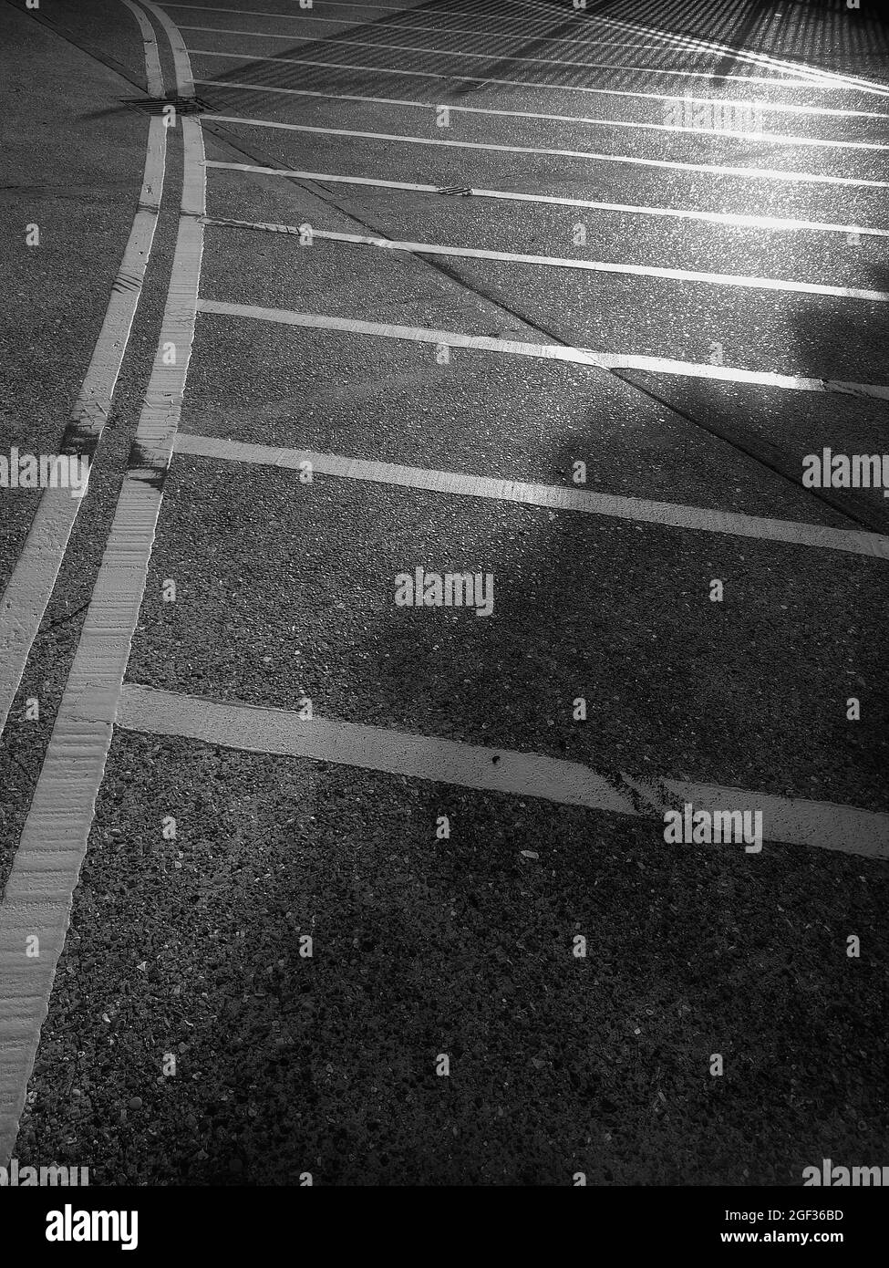 Grey asphalt road markings Black and White Stock Photos & Images - Alamy
