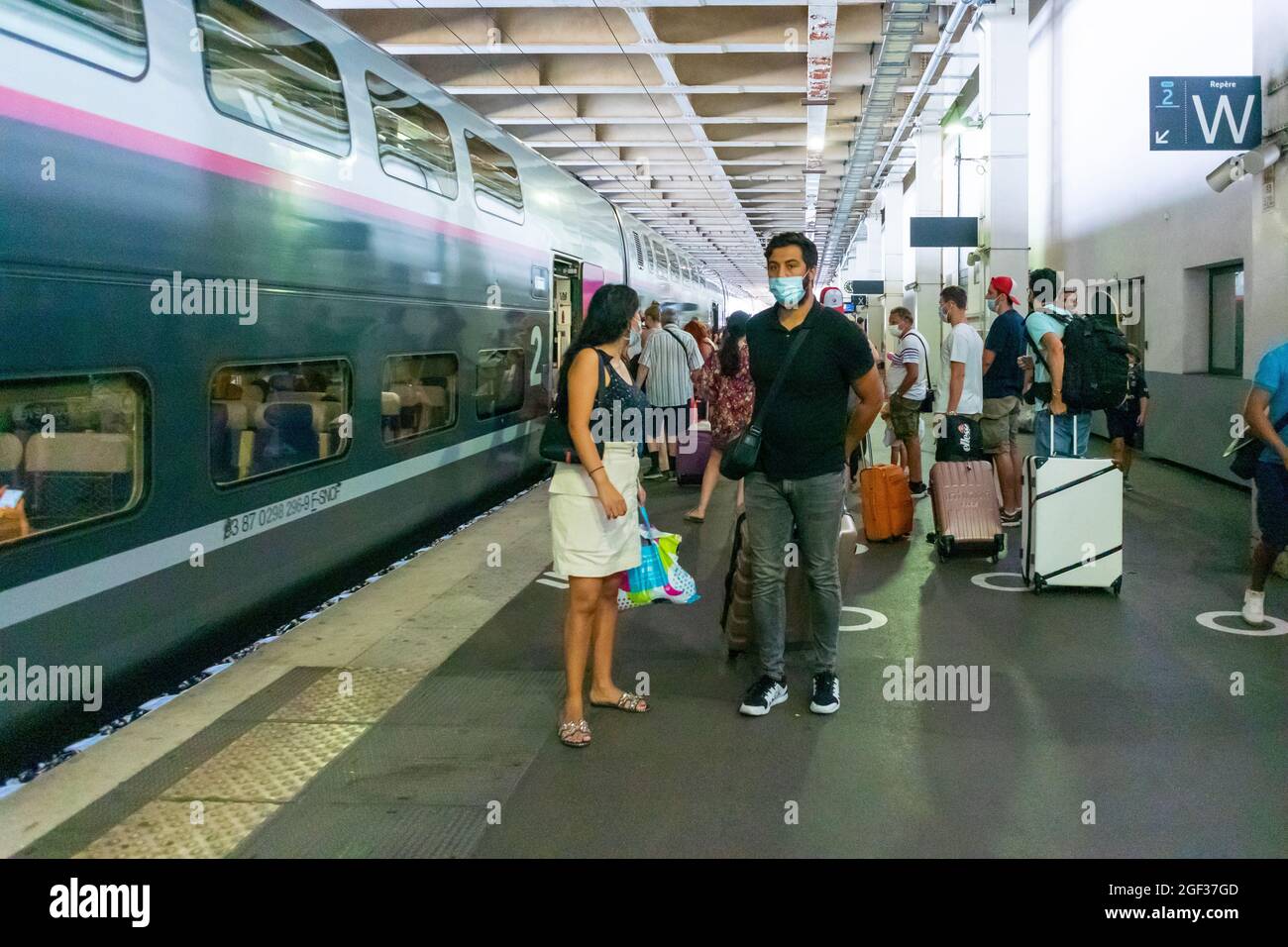 Cannes, France, people urban public in Train Station with Covid Masks