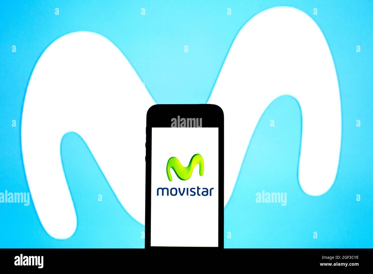 In this photo illustration a Movistar logo seen displayed on a smartphone. Stock Photo