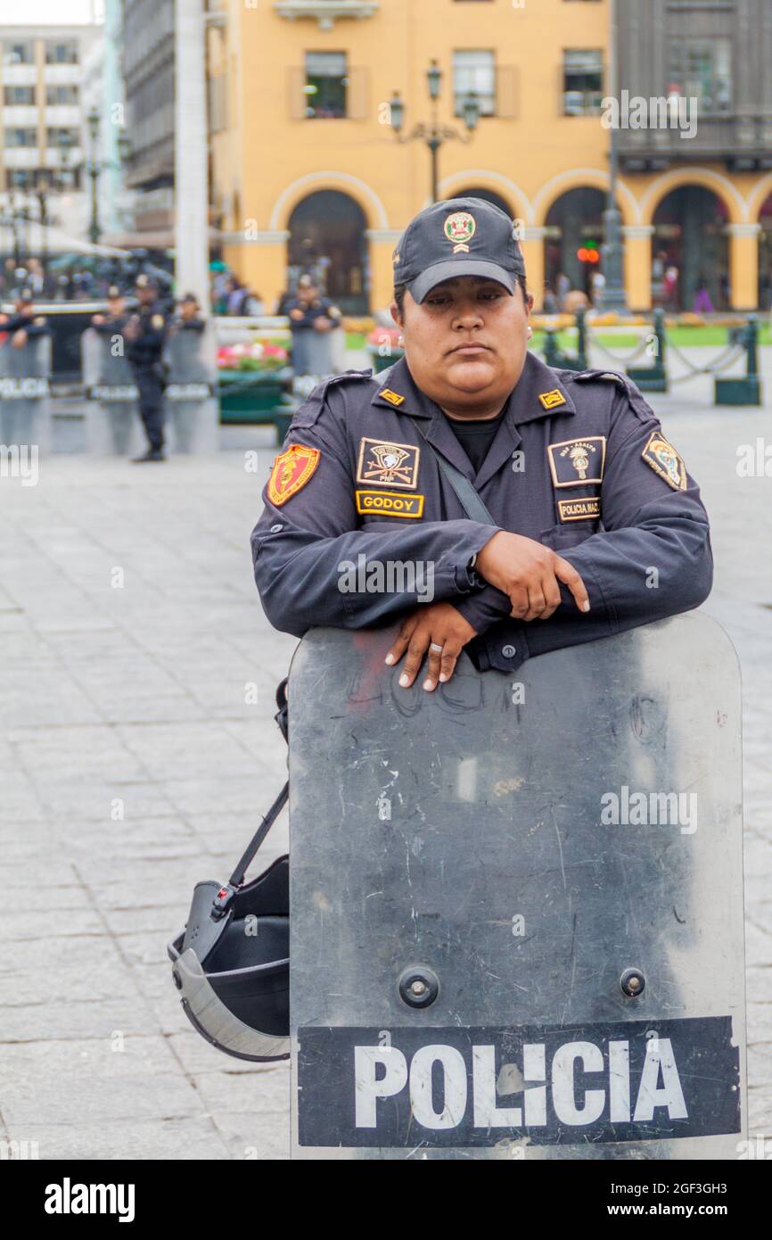 LIMA, PERU - JUNE 4, 2015: Member of police at Plaza de Armas square in Lima, Peru Stock Photo