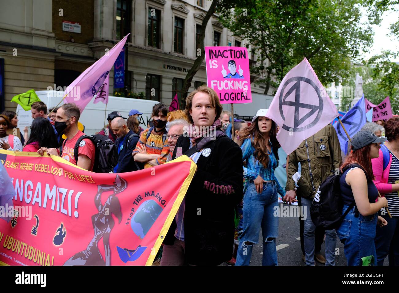 LONDON - 23RD AUGUST 2021: Extinction Rebellion climate change activists occupy the Long Acre crossroads in the West End of London. Stock Photo