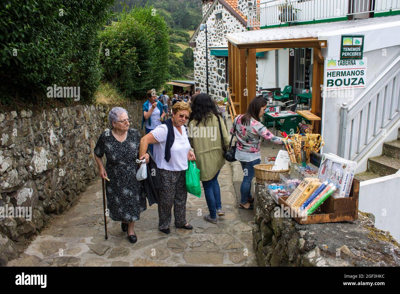 Cedeira, Spain. Pilgrims at the shrine of Santo Andre de Teixido, a Galician pilgrimage site in Galicia Stock Photo