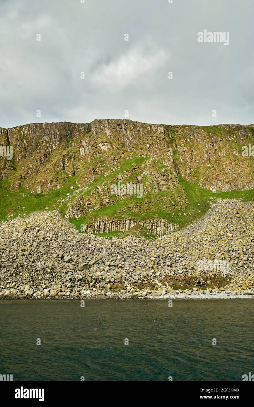 The volcanic basalt and dolerite columns on the cliffs of Garbh Eilean in the Shiant Isles. Stock Photo