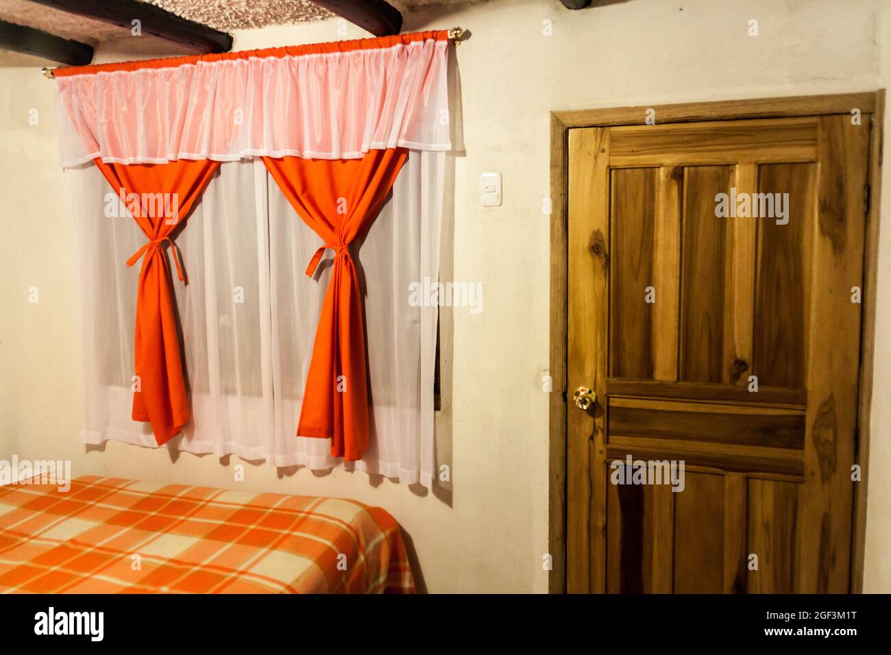 ISINLIVI, ECUADOR - SEPTEMBER 5, 2015: View of a room in Tatia Cristobal hostel in Isinlivi village. This village lies on popular Quilotoa loop. Stock Photo