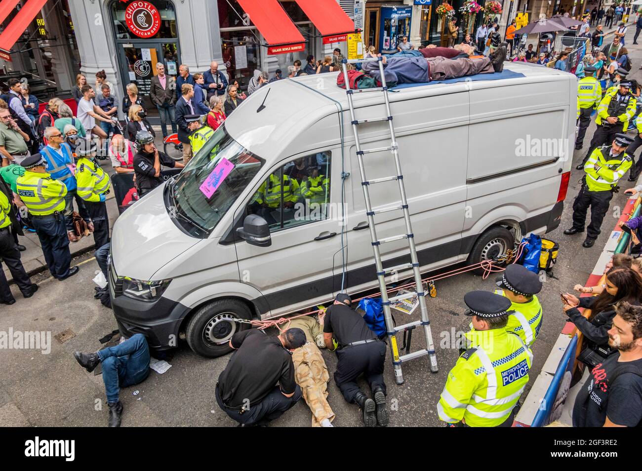 London UK. 23rd Aug 2021. Police cordon off a disabled van with