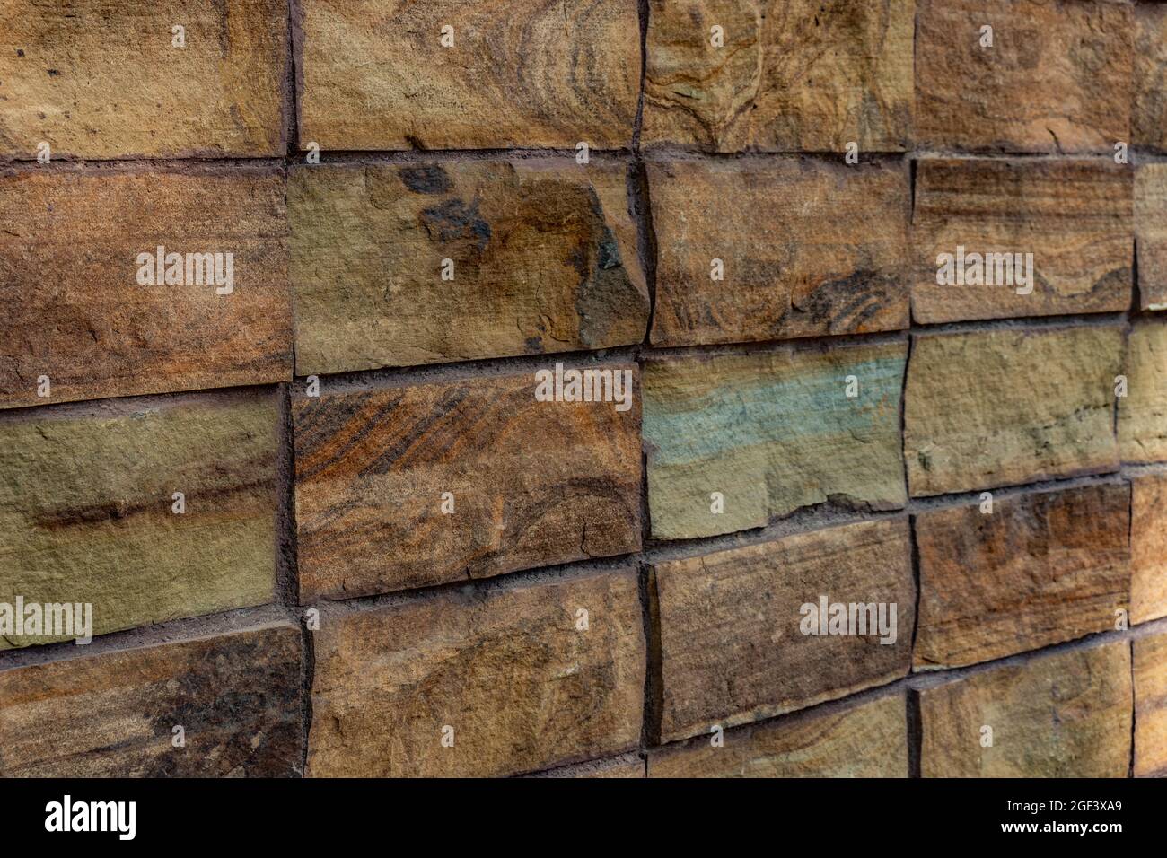 Wide angle side view of stone wall texture for background Stock Photo