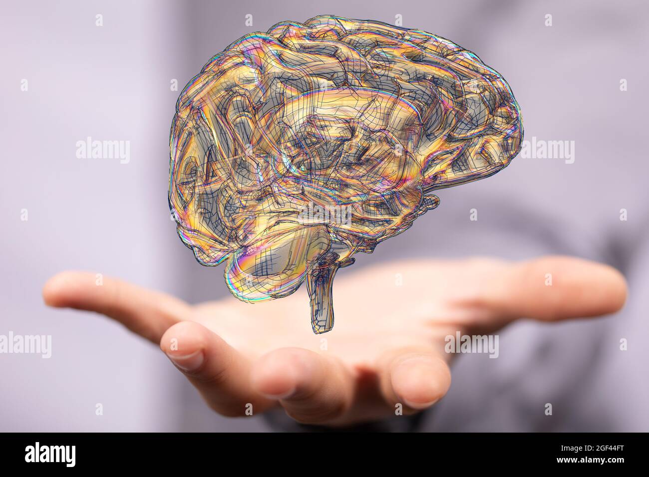 Hand with a floating 3D human brain icon above Stock Photo - Alamy