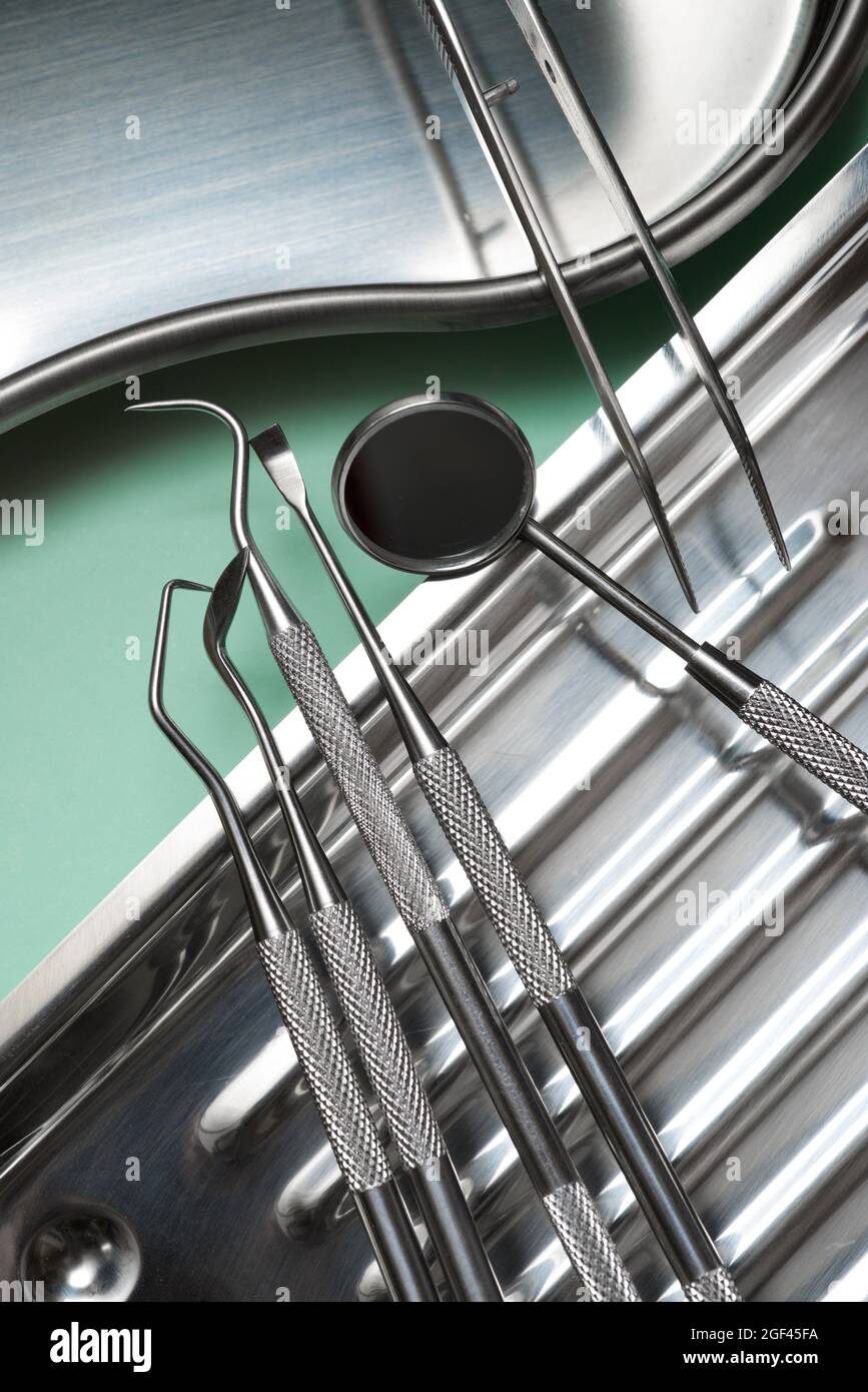 Instruments used by the dentist on a metal tray Stock Photo Alamy