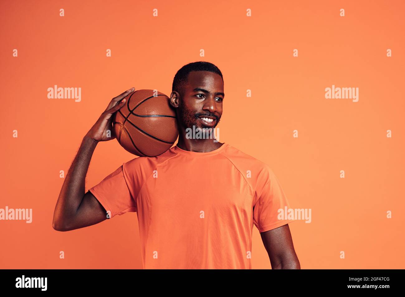Person wearing orange shirt hi-res stock photography and images - Alamy