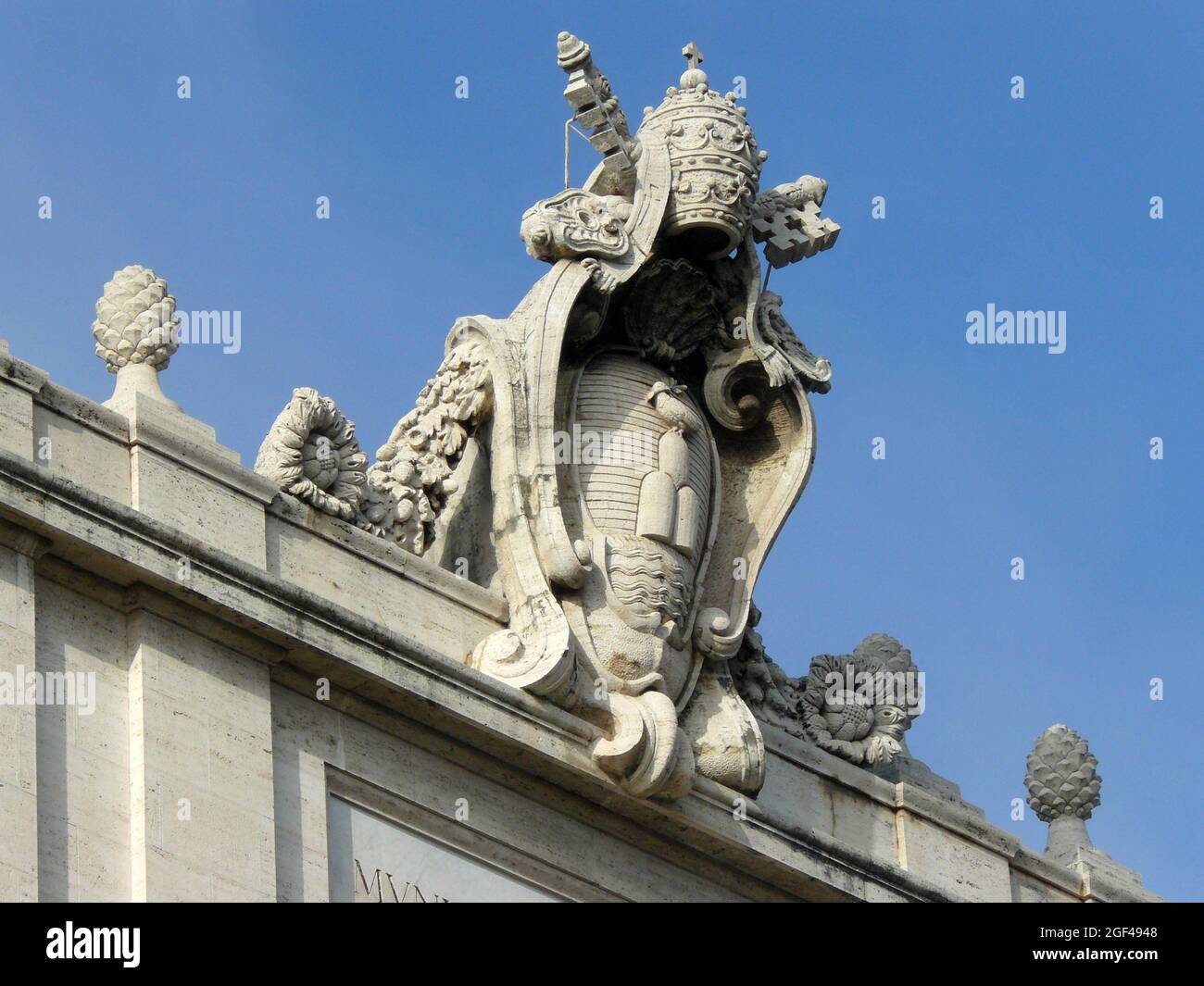 Vatican City (Italy). Shield of Alexander VII on the main facade of St. Peter's Basilica in Vatican City. Stock Photo