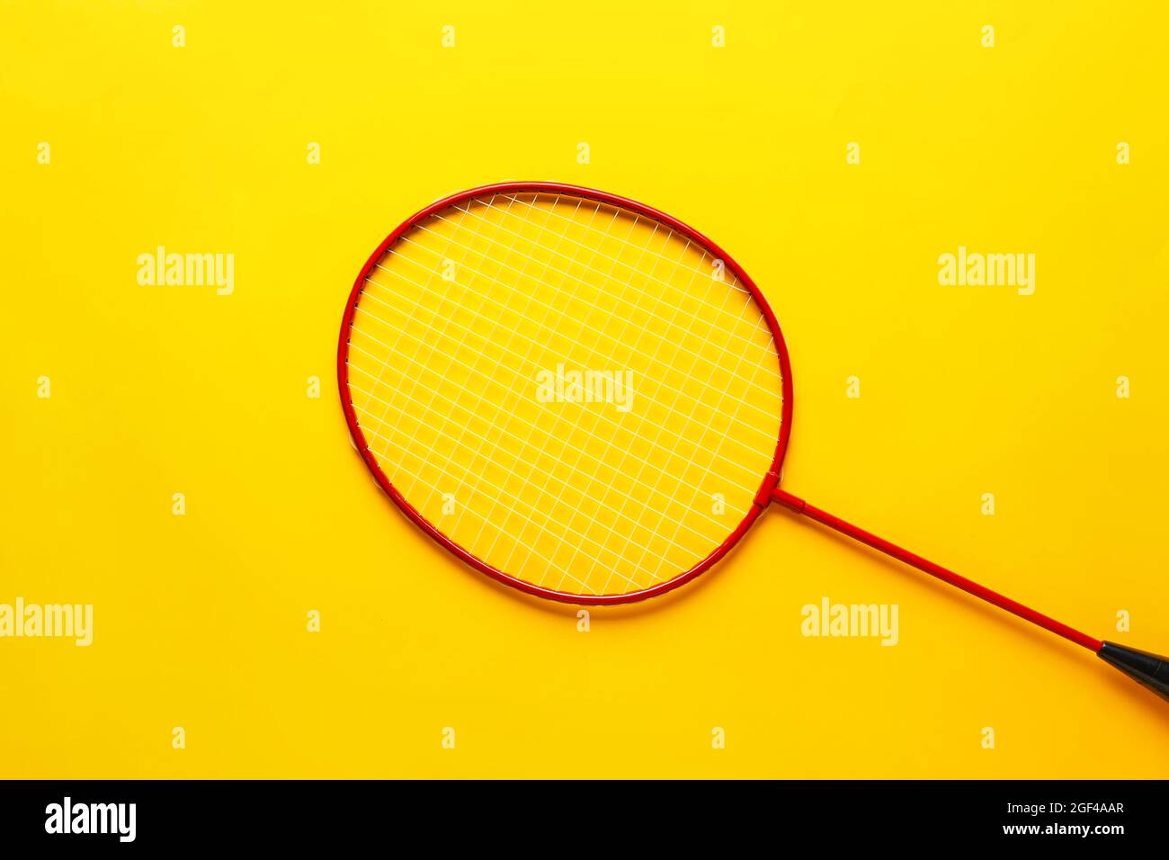 Badminton racket on color background Stock Photo - Alamy