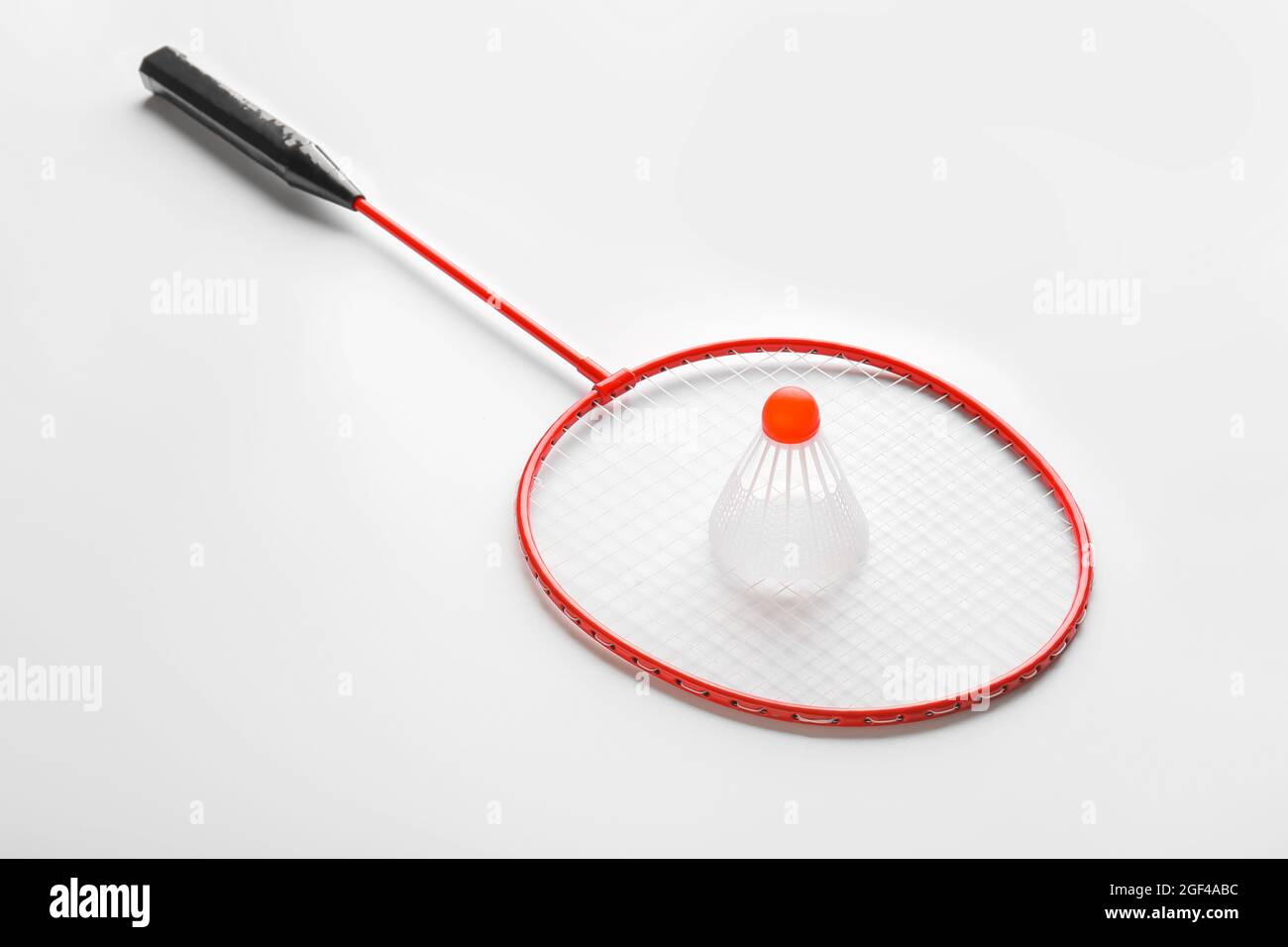 Badminton racket and shuttlecock on white background Stock Photo - Alamy
