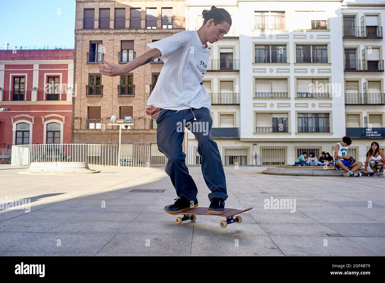 young person riding on skateboard in the city Stock Photo - Alamy