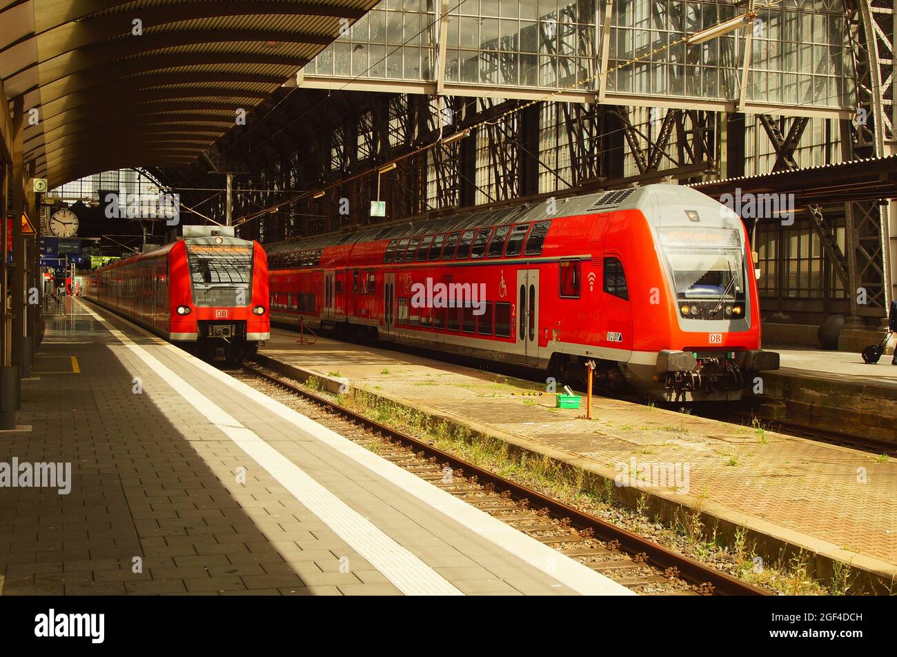 FRANKFURT, GERMANY - Aug 20, 2021: An S-Bahn and a regional train at Frankfurt Central Station are waiting to depart. Stock Photo
