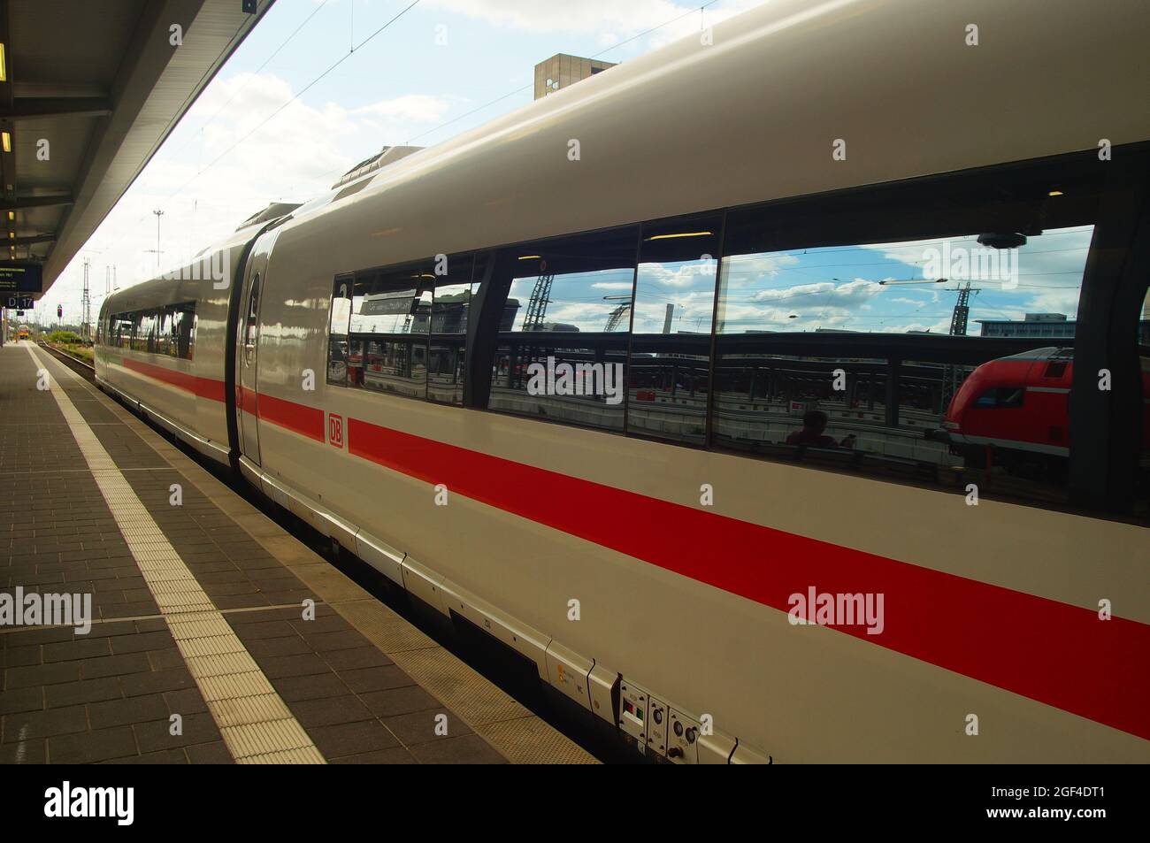 FRANKFURT, GERMANY - Aug 20, 2021: An Intercity Express ICE3 on the platform at Frankfurt Central Station. Backlight and reflection. Stock Photo