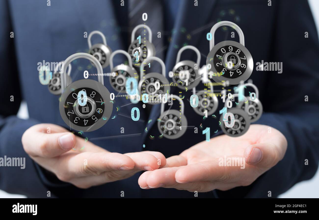 Man holding the virtual 3D padlock icons symbolizing data security Stock Photo