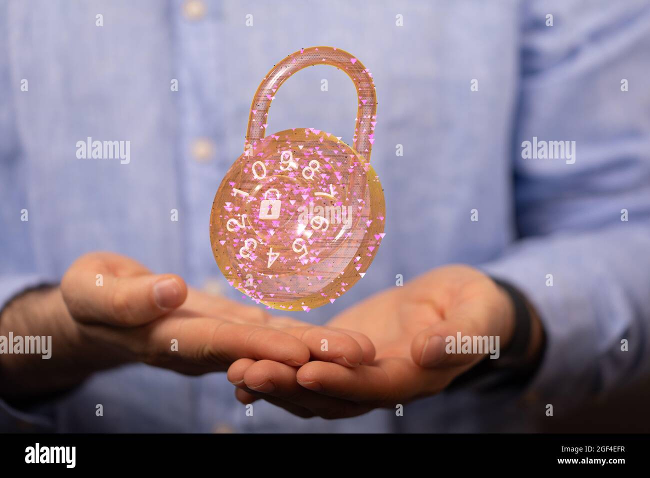 Man holding the virtual 3D padlock icon symbolizing data security Stock Photo