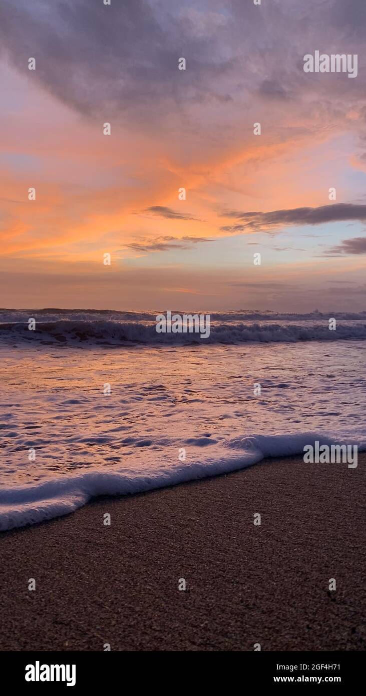 Scenic view of the beautiful sunset on a beach in Bali, Indonesia Stock ...