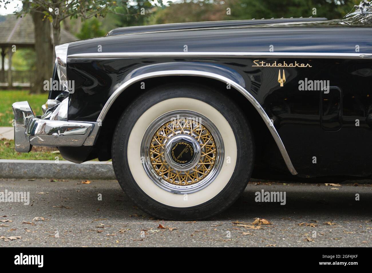 Front left fender, wheel and tire of the classic 1957 Studebaker Golden Hawk. Stock Photo