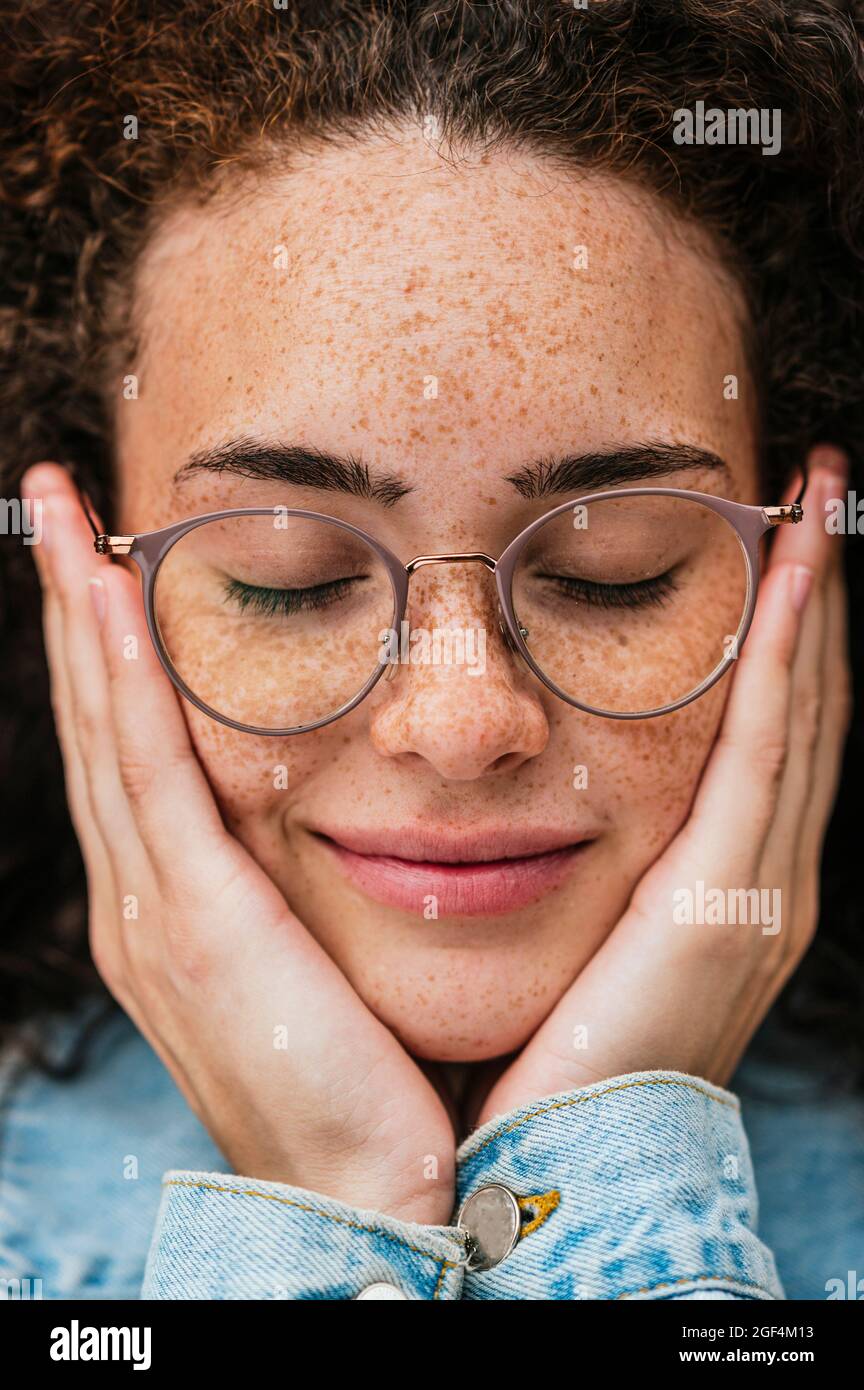 https://c8.alamy.com/comp/2GF4M13/beautiful-young-woman-wearing-eyeglasses-with-eyes-closed-2GF4M13.jpg