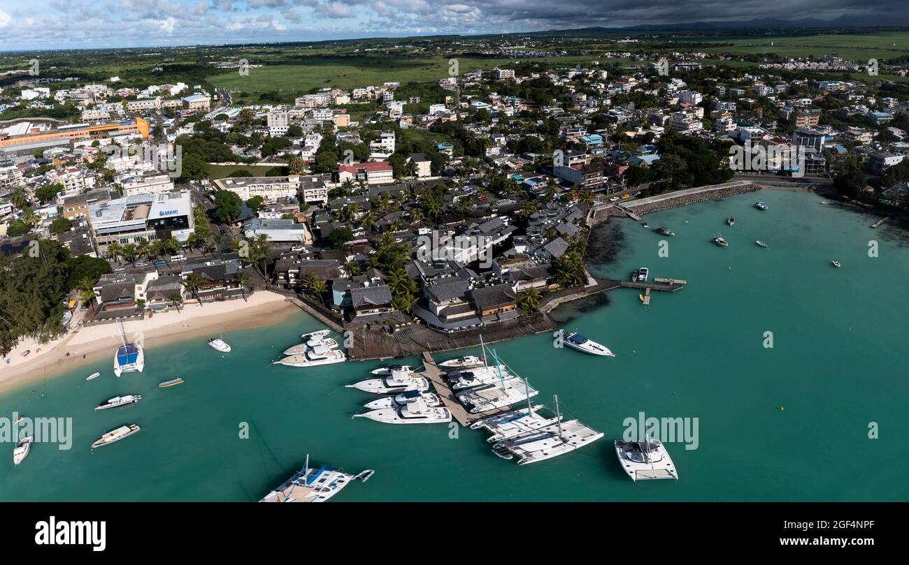 Harbor townscape trou aux biches mauritius hires stock photography and