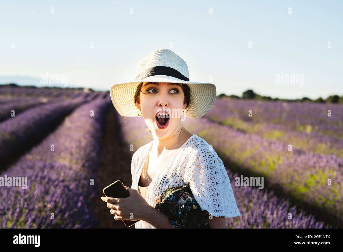 Surprised smart woman hi-res stock photography and images - Alamy