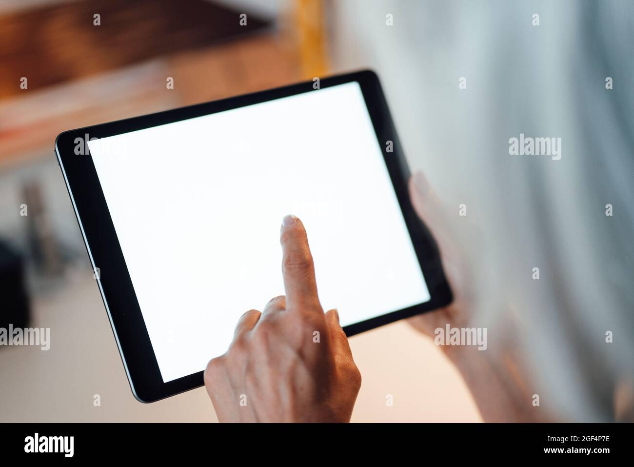 Businesswoman using digital tablet at office Stock Photo