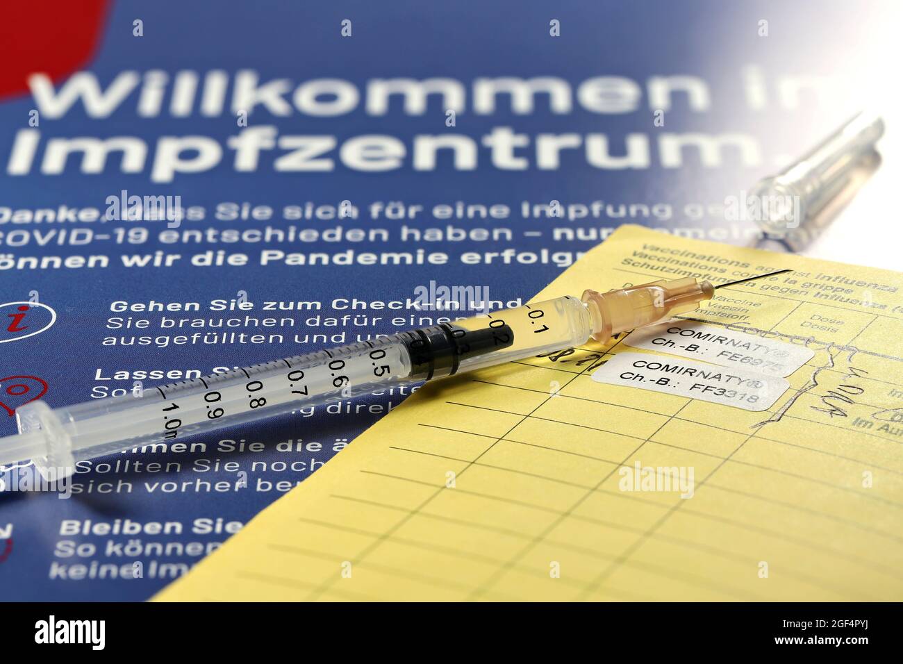 Documentation of the first and second vaccination with BioNTech/Pfizer COVID-19 vaccine Comirnaty given in a German vaccination center. Stock Photo