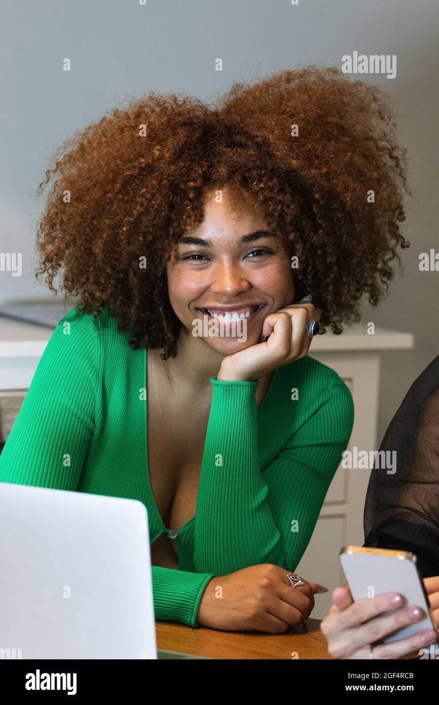 Hand and remote and afro hi-res stock photography and images - Alamy