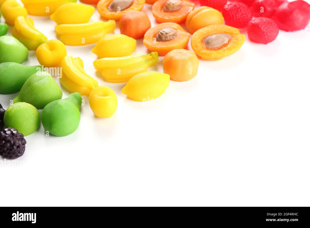 Fruit candies isolated on white Stock Photo - Alamy