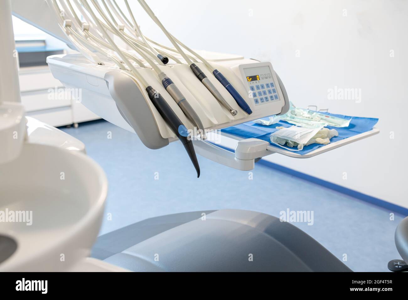 Modern dental practice. Dental chair and other accessories used by dentists Stock Photo