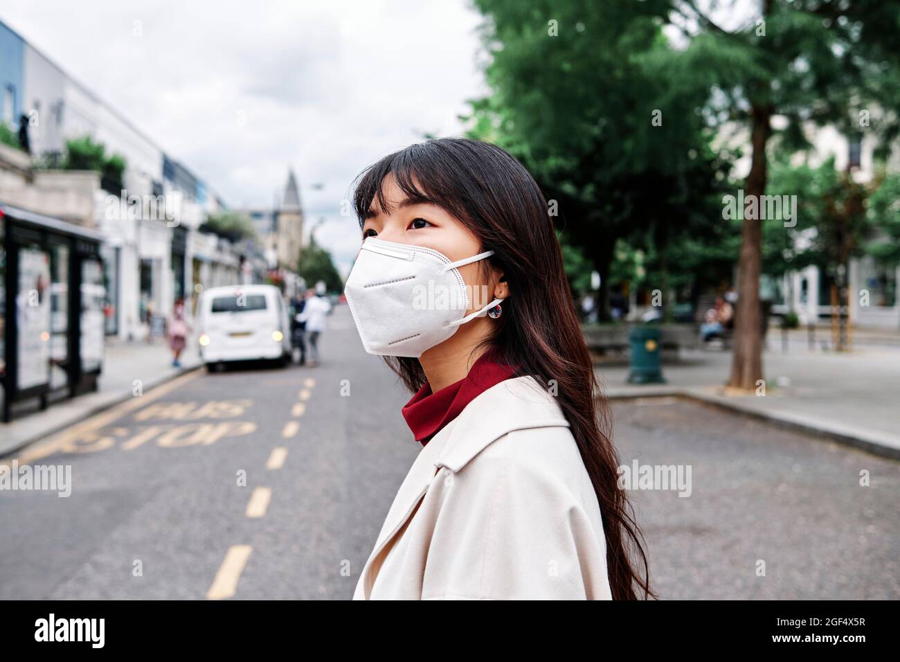 Asian woman face mask london hi-res stock photography and images - Alamy