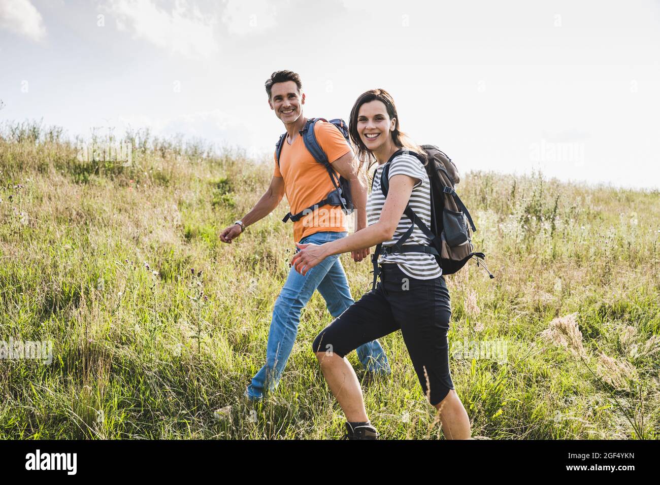 Man woman female couple walking hiking hi-res stock photography and ...