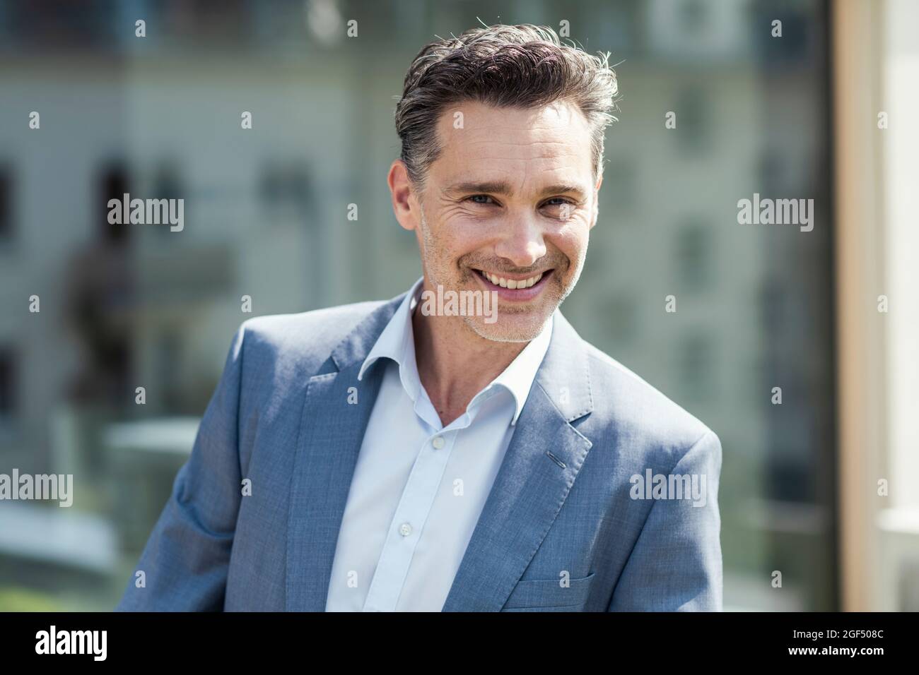 Confident person smiling in hi-res stock photography and images - Alamy