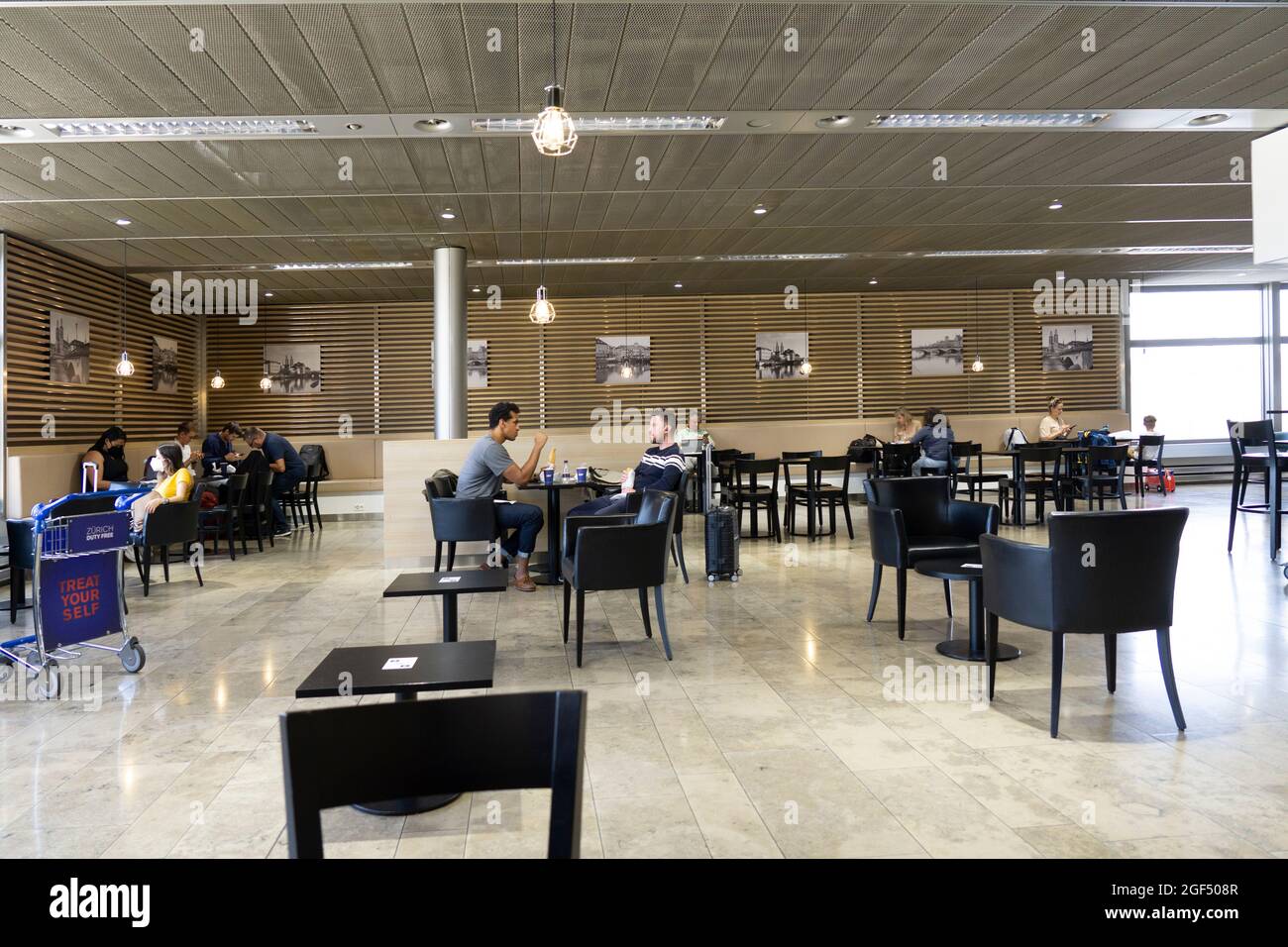 Zurich, Switzerland - July 19 2021: Waiting area, place to sit and eat at Zurich Airport in Switzerland Stock Photo
