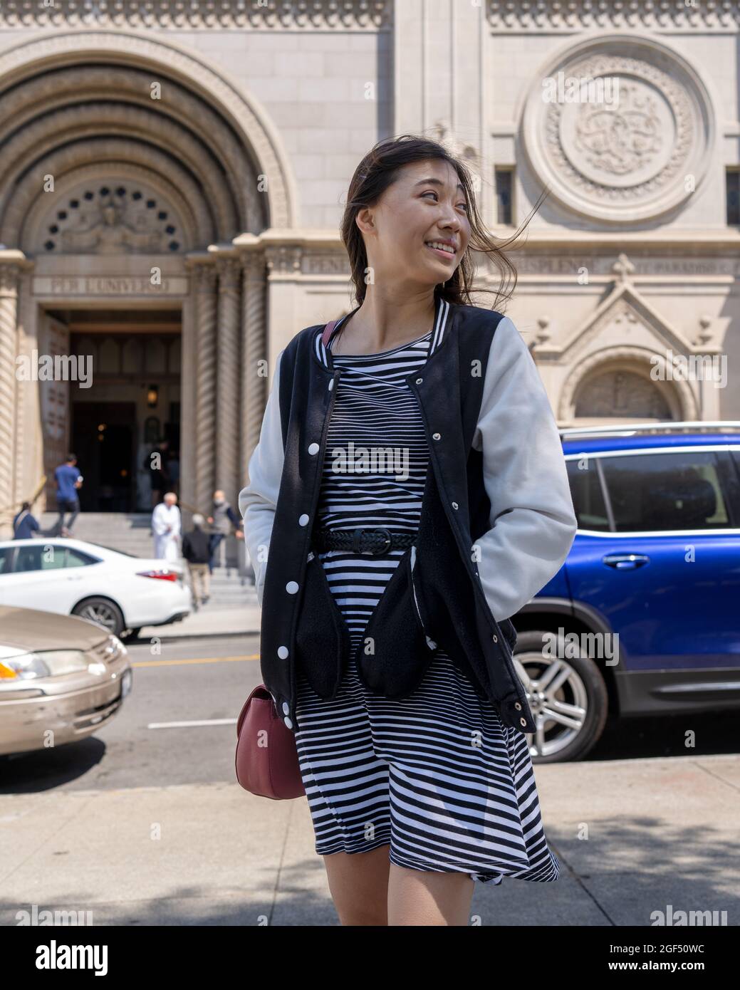 Portrait of a Young Asian Woman Leaving Church in North Beach San Francisco Stock Photo