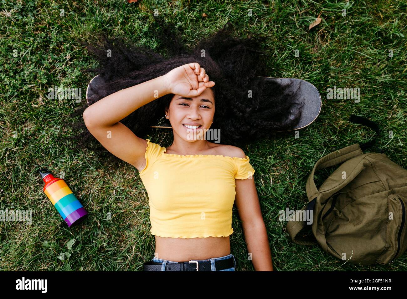 Woman relaxing park hi-res stock photography and images - Alamy