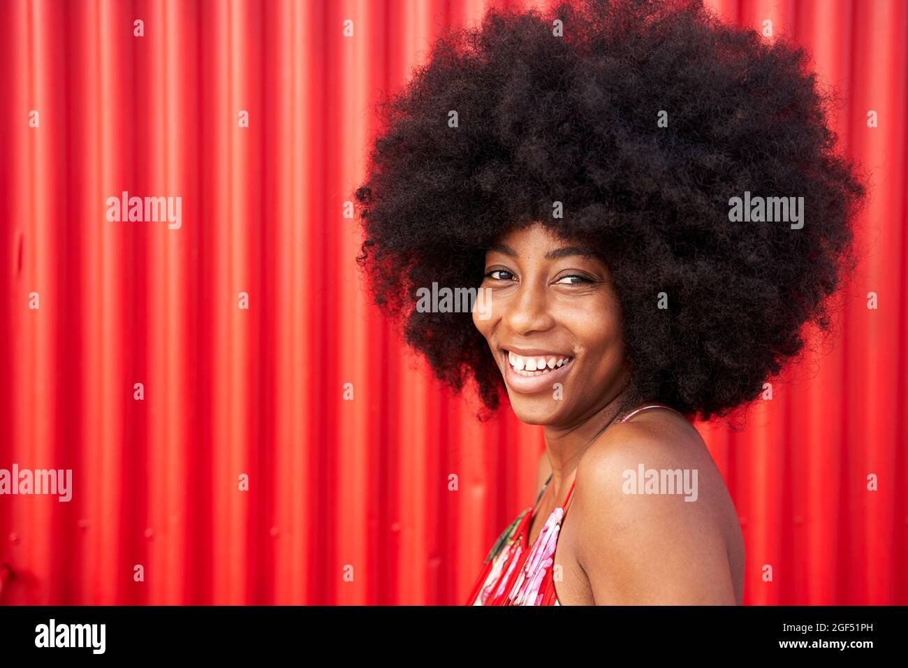 Cheerful black woman smiling hi-res stock photography and images - Alamy