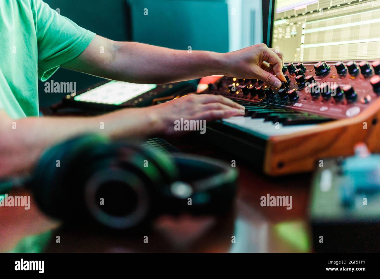DJ working on music in studio Stock Photo