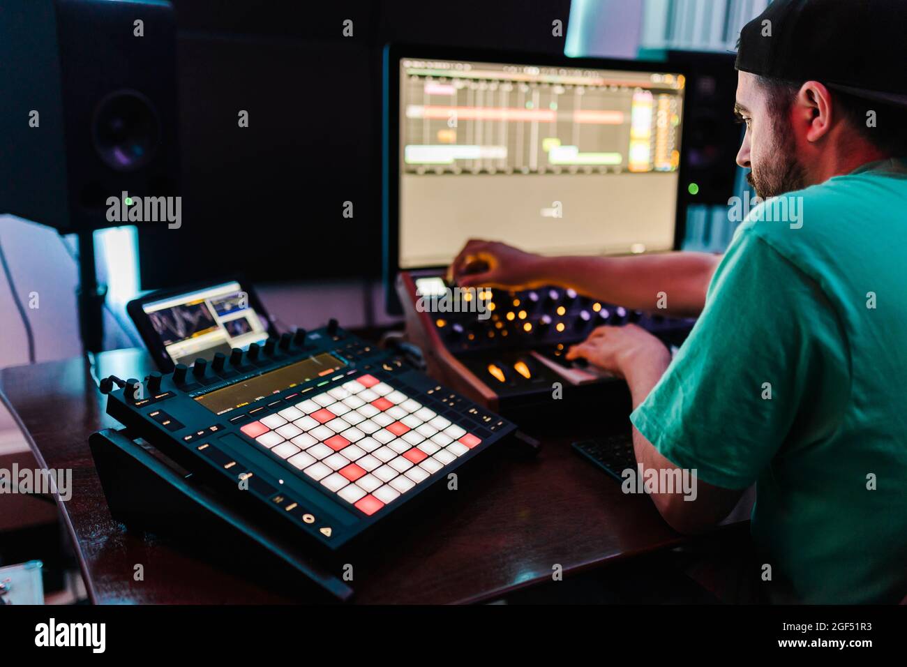 DJ mixing music in recording studio Stock Photo