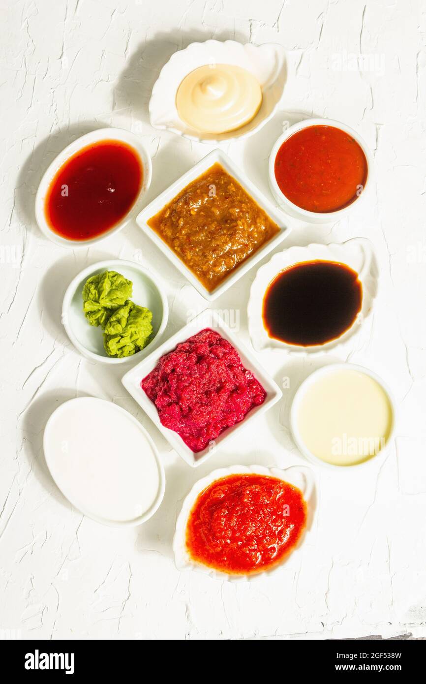 Set of different sauces ketchup, mayonnaise, barbecue, soy, chutney
