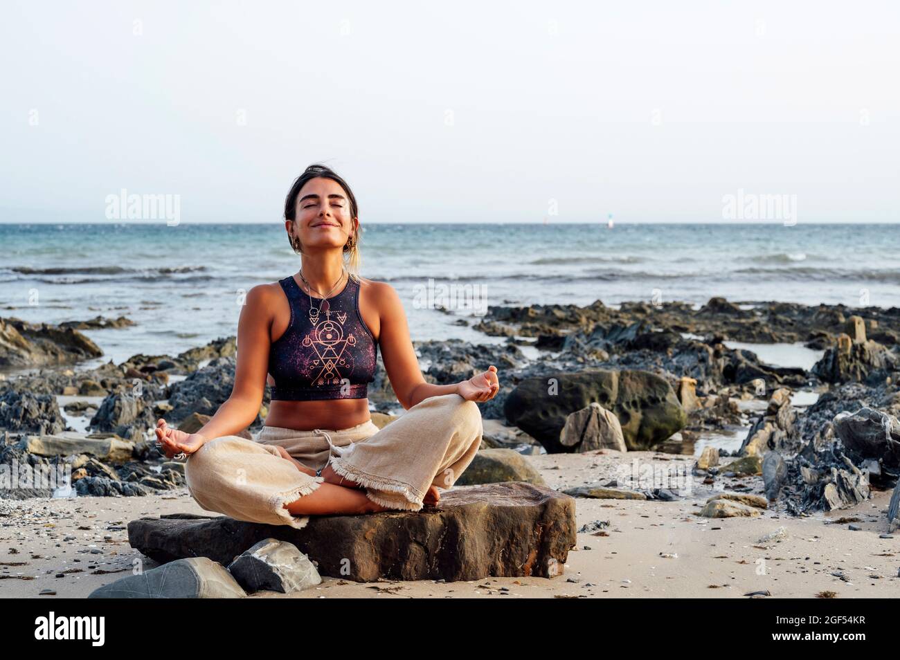 Meditating rock hi-res stock photography and images - Alamy