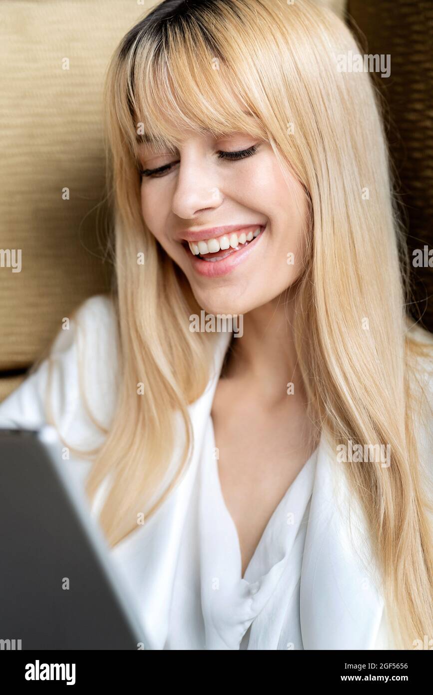 Happy young female professional using digital tablet Stock Photo