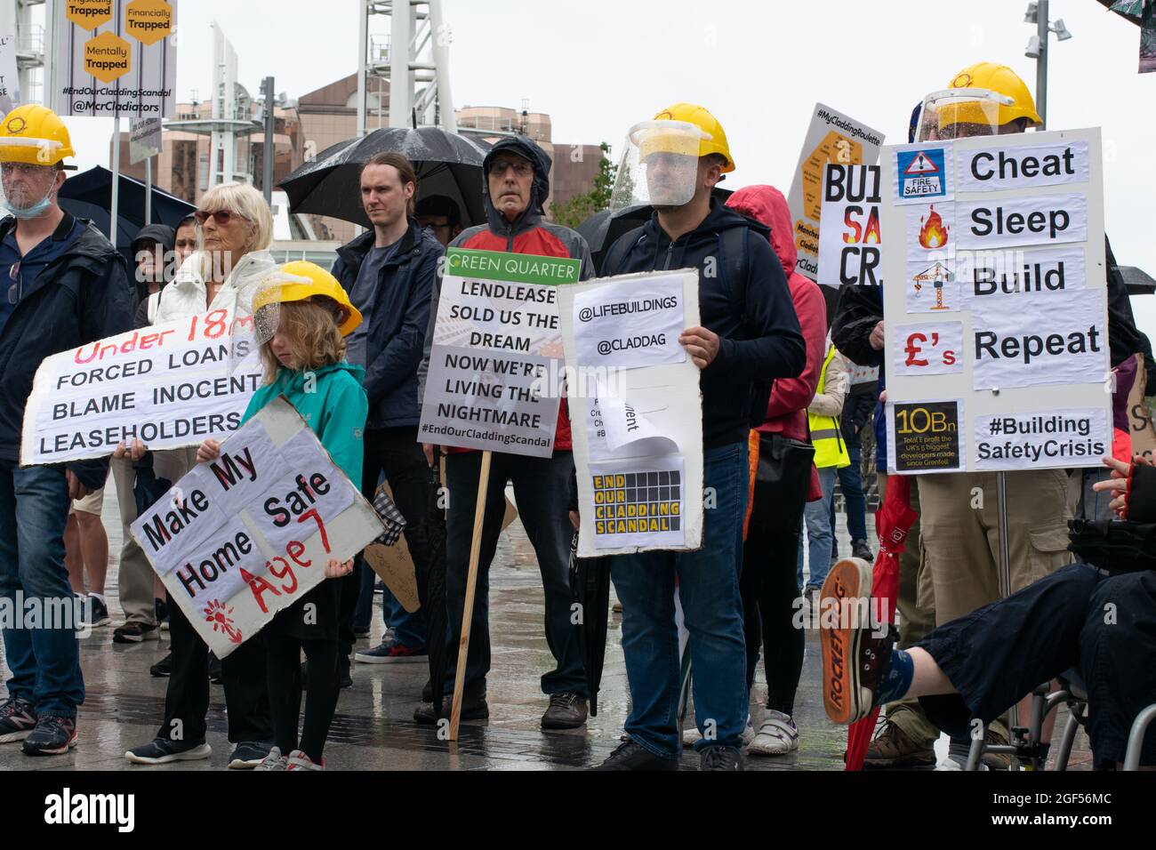 Cladiators rally. Flammable cladding protest with placards at Salford Quays, Manchester UK Stock Photo