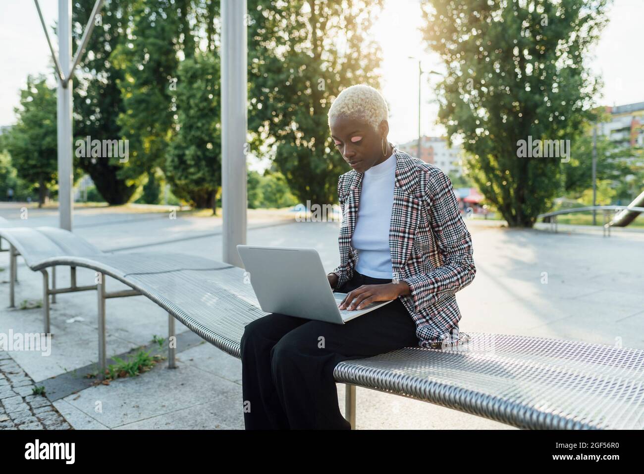 African descent woman sitting hi-res stock photography and images - Alamy