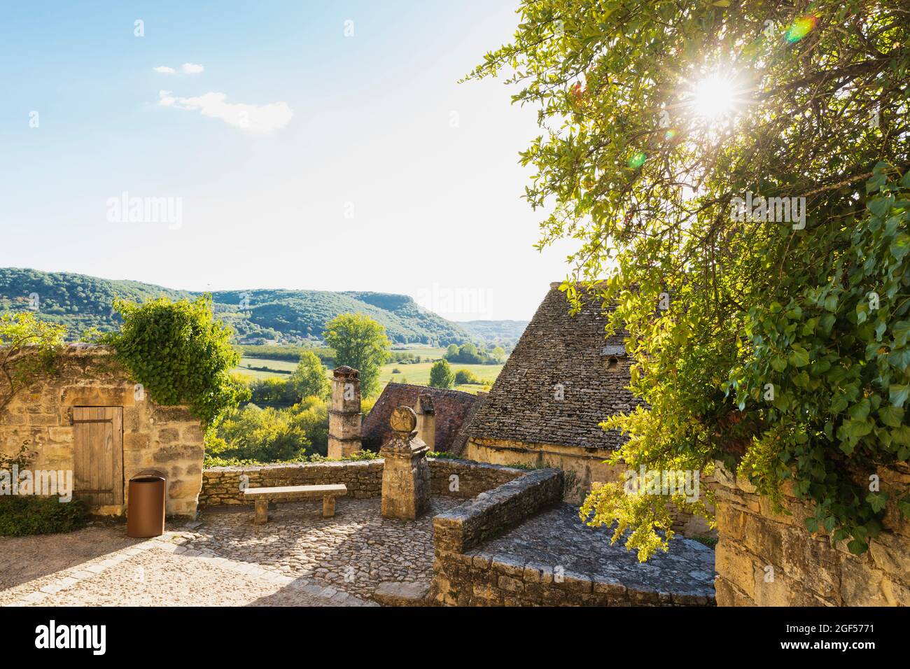 France, Dordogne, Beynac-et-Cazenac, Sun shining over stone architecture of medieval village Stock Photo