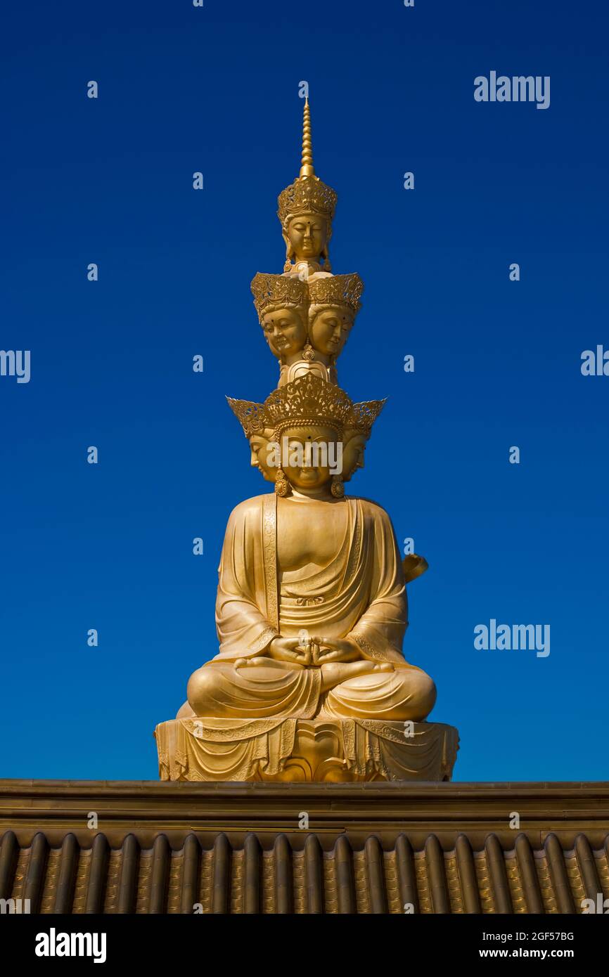 China, Sichuan, Emeishan City, Golden statue of Samantabhadra at summit of Mount Emei Stock Photo