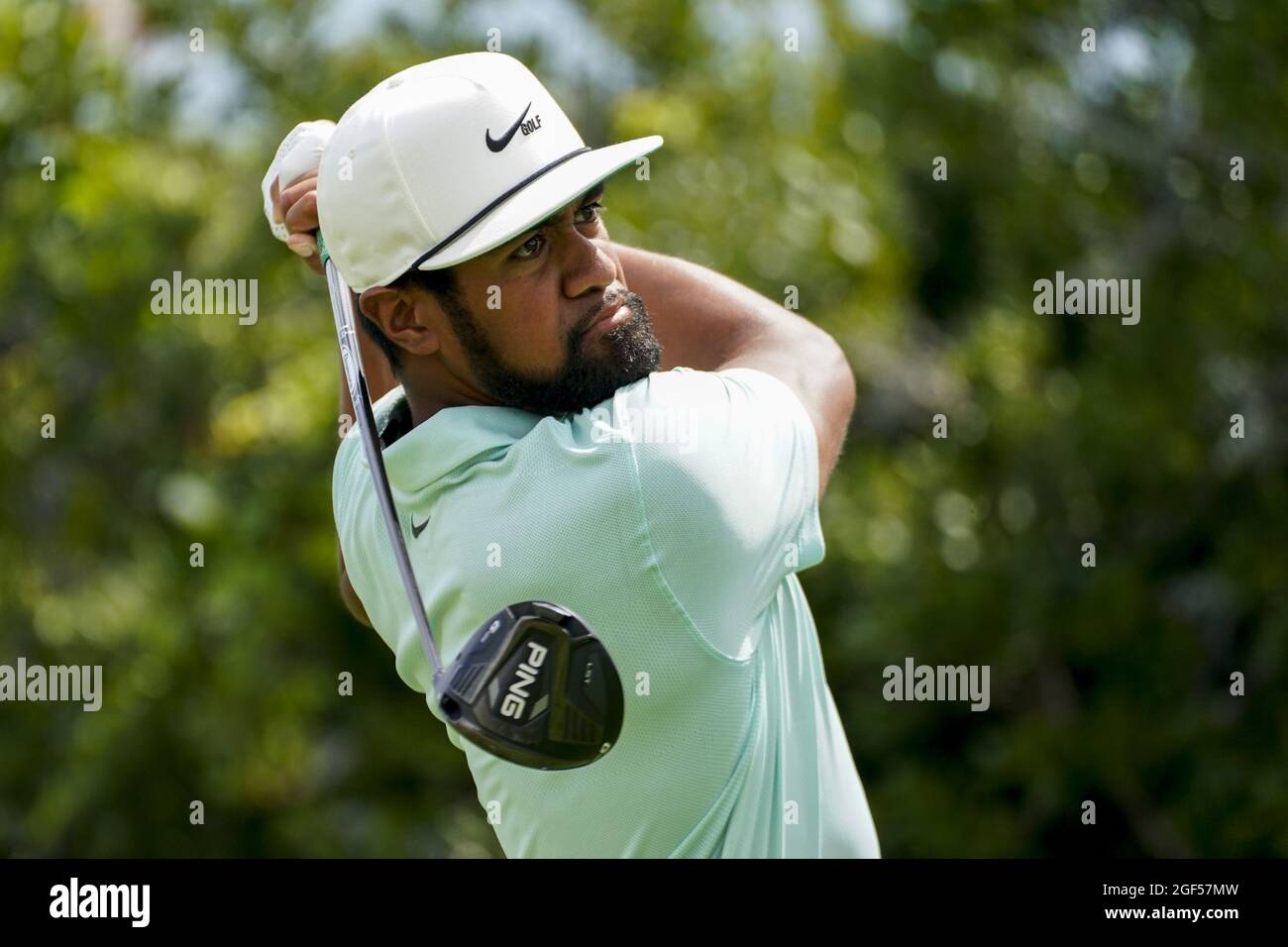 New York, United States. 23rd Aug, 2021. Tony Finau hits hits his tee shot on  the 3rd hole in the final round of the 2021 Northern Trust as part of of the